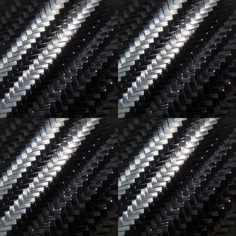 Experience the precise engineering of carbon fibre. A sophisticated palette of deep blacks and silver-greys. Made to order.