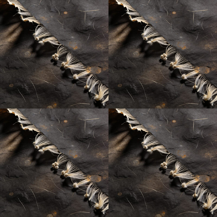 Immerse your space in the quiet authority of our Dark Paper Texture mural. Deep brownish-black, warm accents. Made to order.